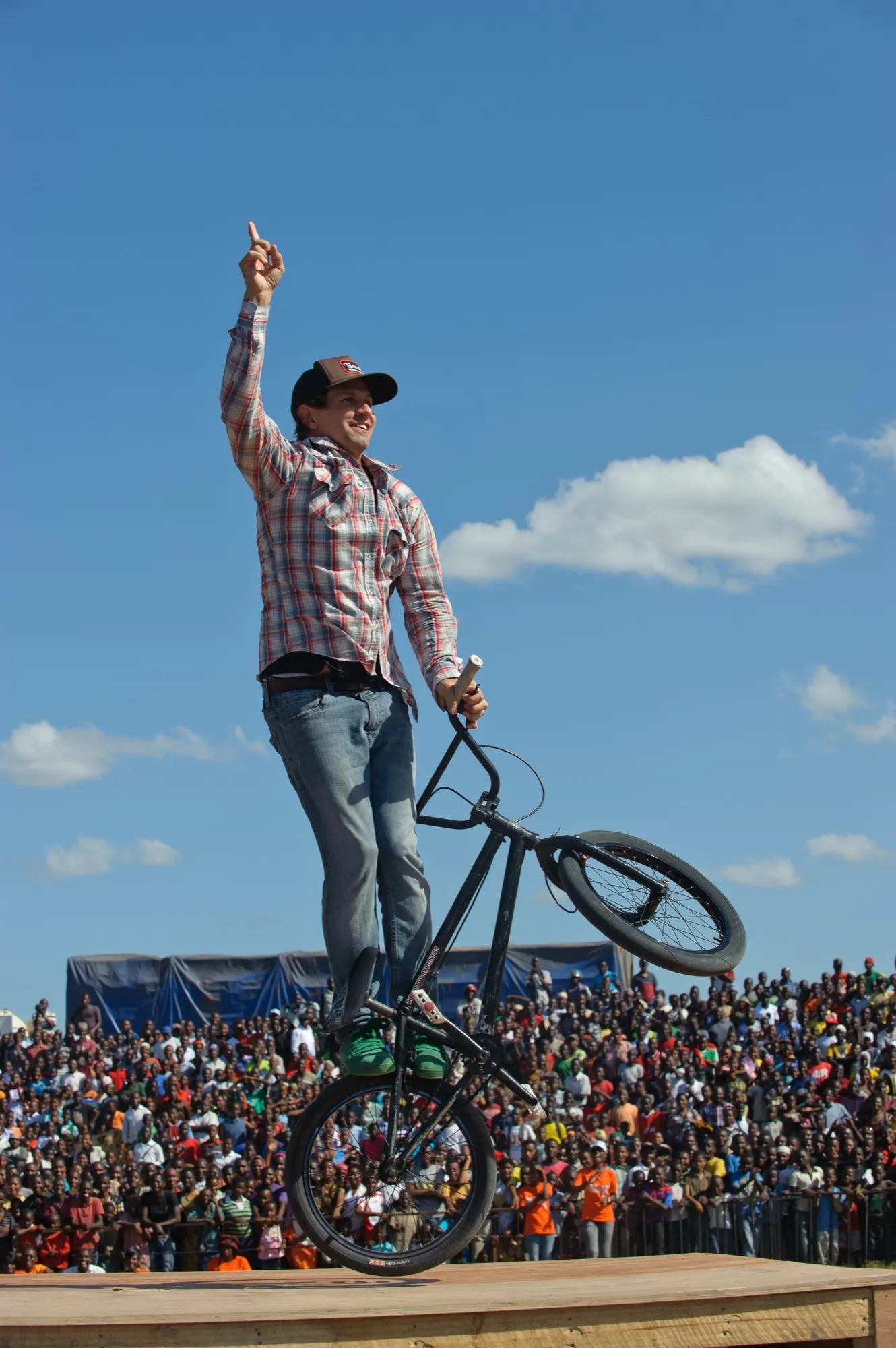 StuntDudes rider pointing to the crowd mid-run